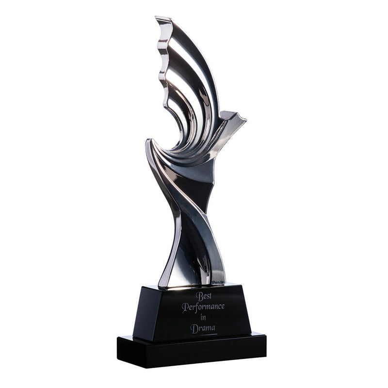 Silver figurine on black crystal base